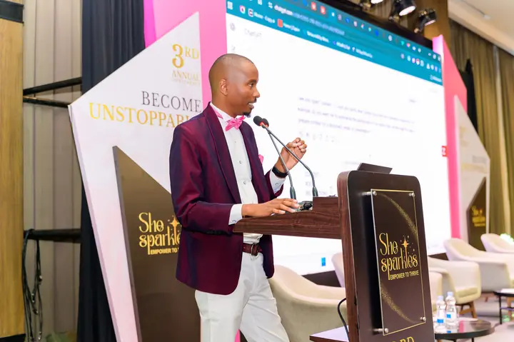 Cephas presenting from a lectern on stage