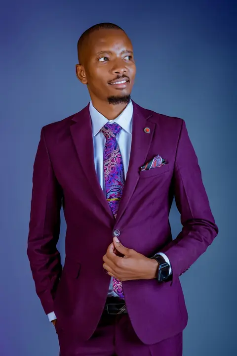 Portrait of Cephas Gathii in a purple suit