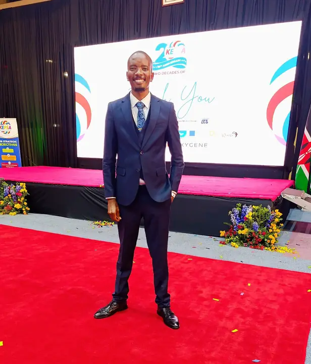 Cephas on stage at a business event
